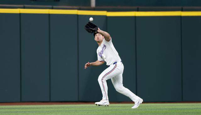 Texas Rangers outfielder Wyatt Langford makes a catch against the Cincinnati Reds on Friday, April 3, 2026.
